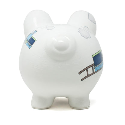 Rear view of white piggy bank featuring blue box car train design on white ceramic