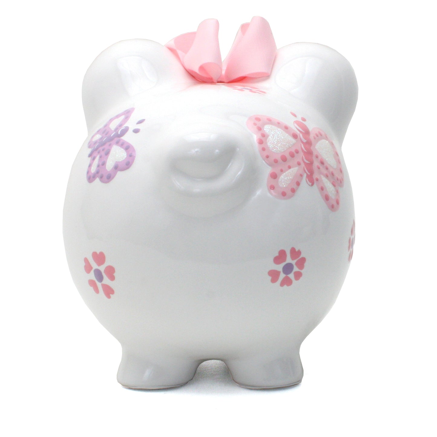 Back view of white ceramic piggy bank showing butterfly and flower designs with pink bow