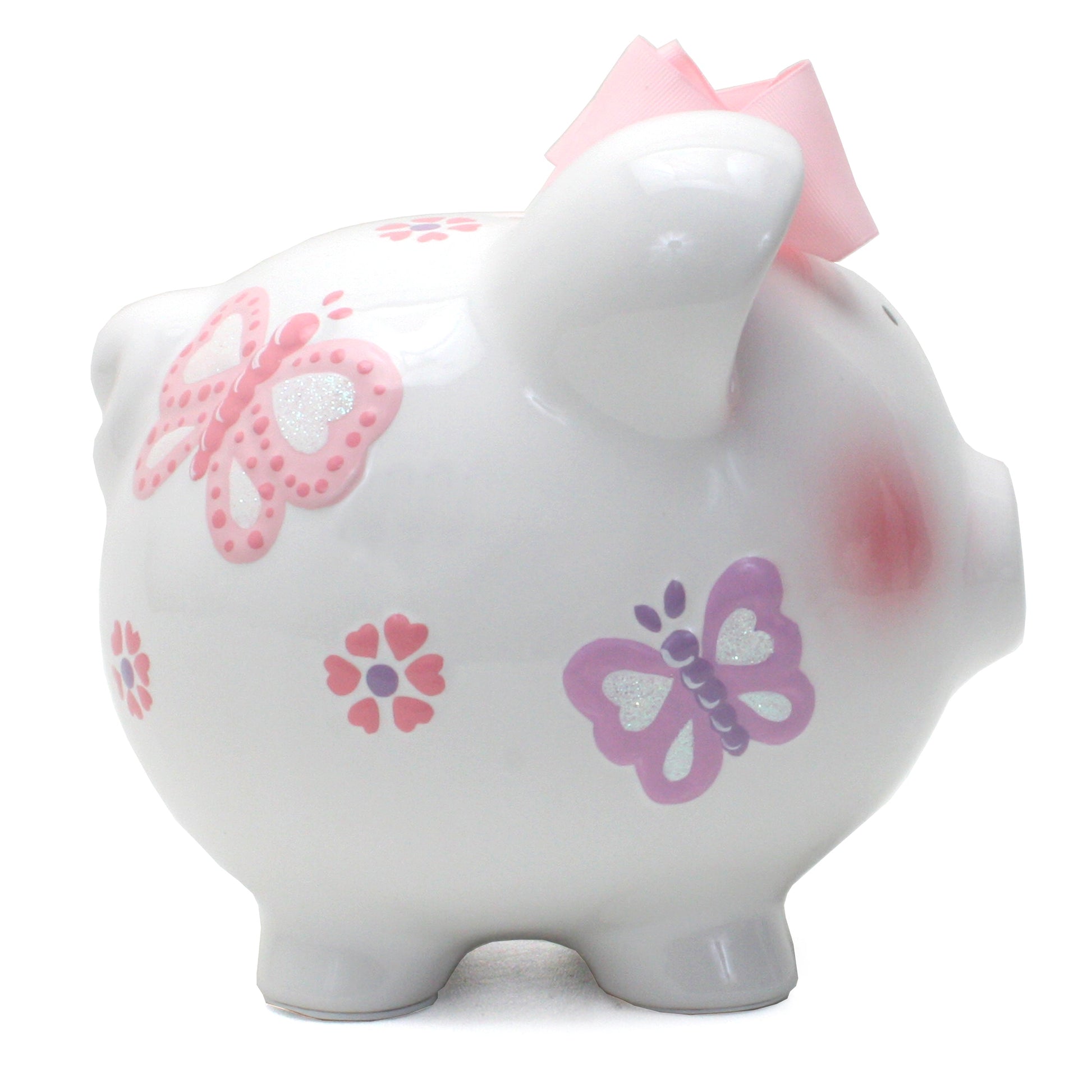Side view showing detailed handpainted purple and pink butterflies and flowers on piggy bank