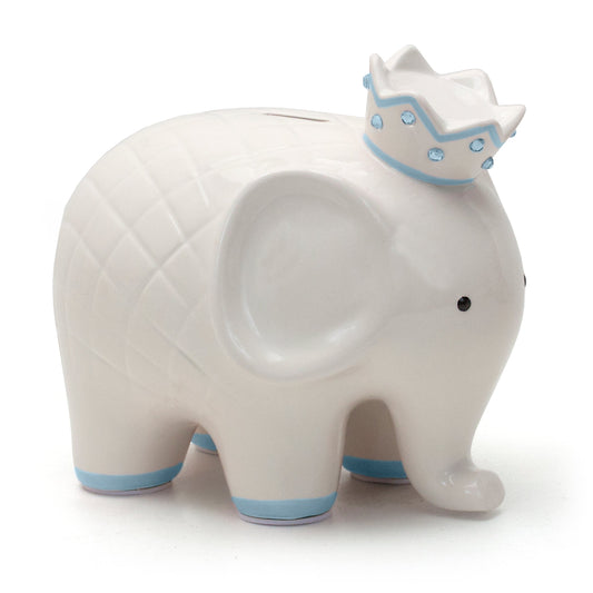 Side view of white ceramic elephant piggy bank with blue crown and blue accents on feet