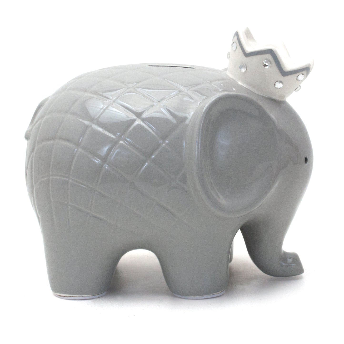 Close-up right side of gray elephant piggy bank focusing on ear and crown