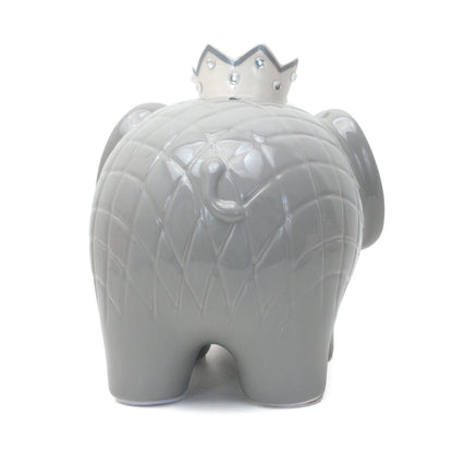 Front view of gray elephant piggy bank showing black eyes and silver crown details