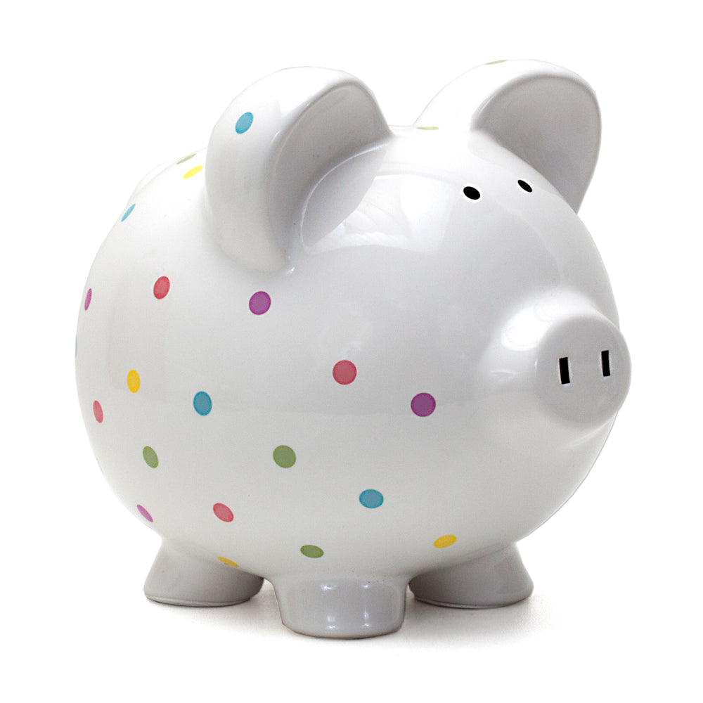 Front angled view of white ceramic piggy bank with colorful confetti dots