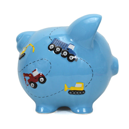 Opposite side view of blue ceramic piggy bank with colorful construction vehicle artwork