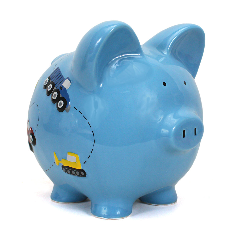 Side view of blue ceramic piggy bank with handpainted construction trucks and vehicles
