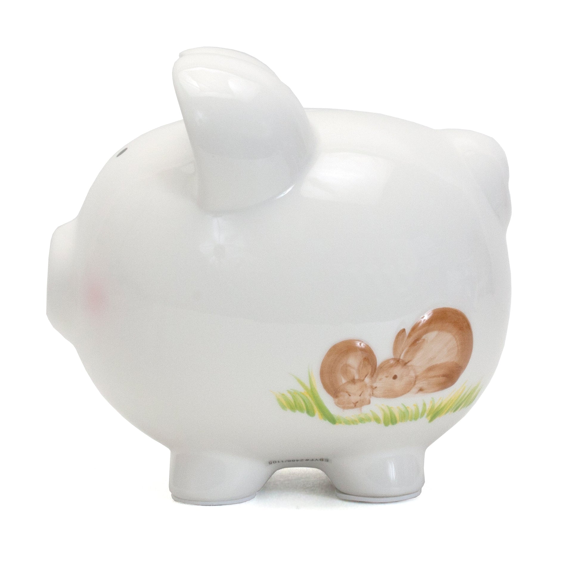 Top view of piggy bank highlighting the coin slot and ear floral detail