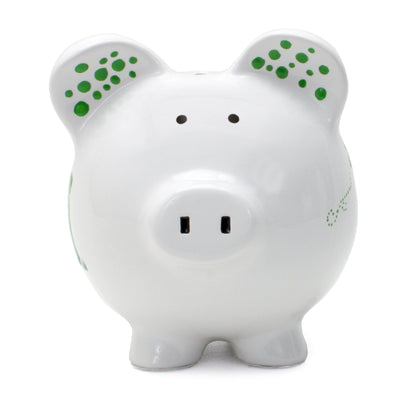 Front view of piggy bank showing black eyes, nostrils, and green decorative dots inside ears