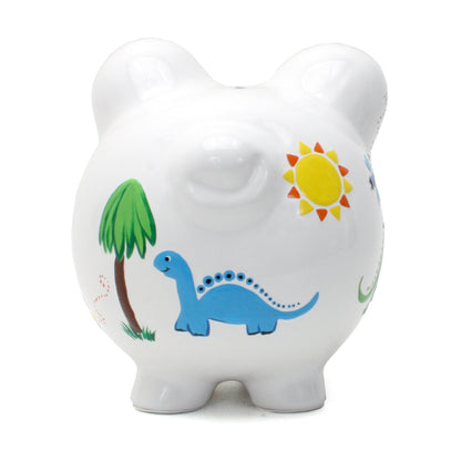 Back side view of white piggy bank featuring handpainted blue dinosaur, tree, and sun