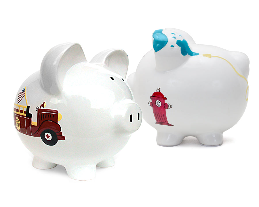 Pair of white piggy banks with similar design, one showing firetruck and the other the fire hydrant, both handpainted