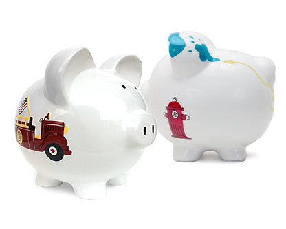 Pair of white piggy banks with similar design, one showing firetruck and the other the fire hydrant, both handpainted