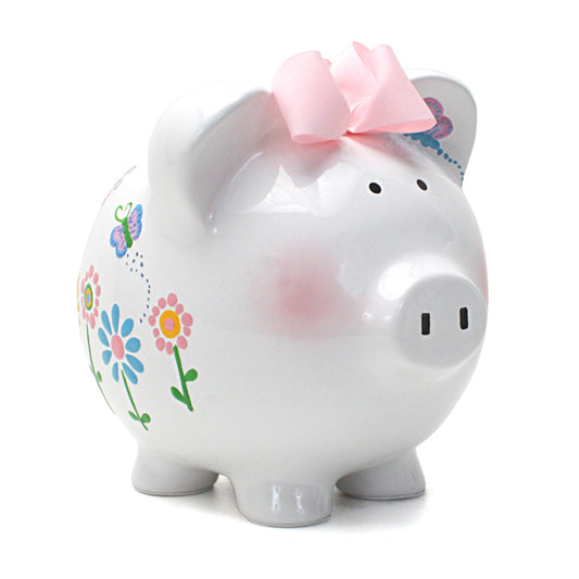 Side view of white ceramic Flutterfly piggy bank with colorful flowers, butterflies, and pink bow