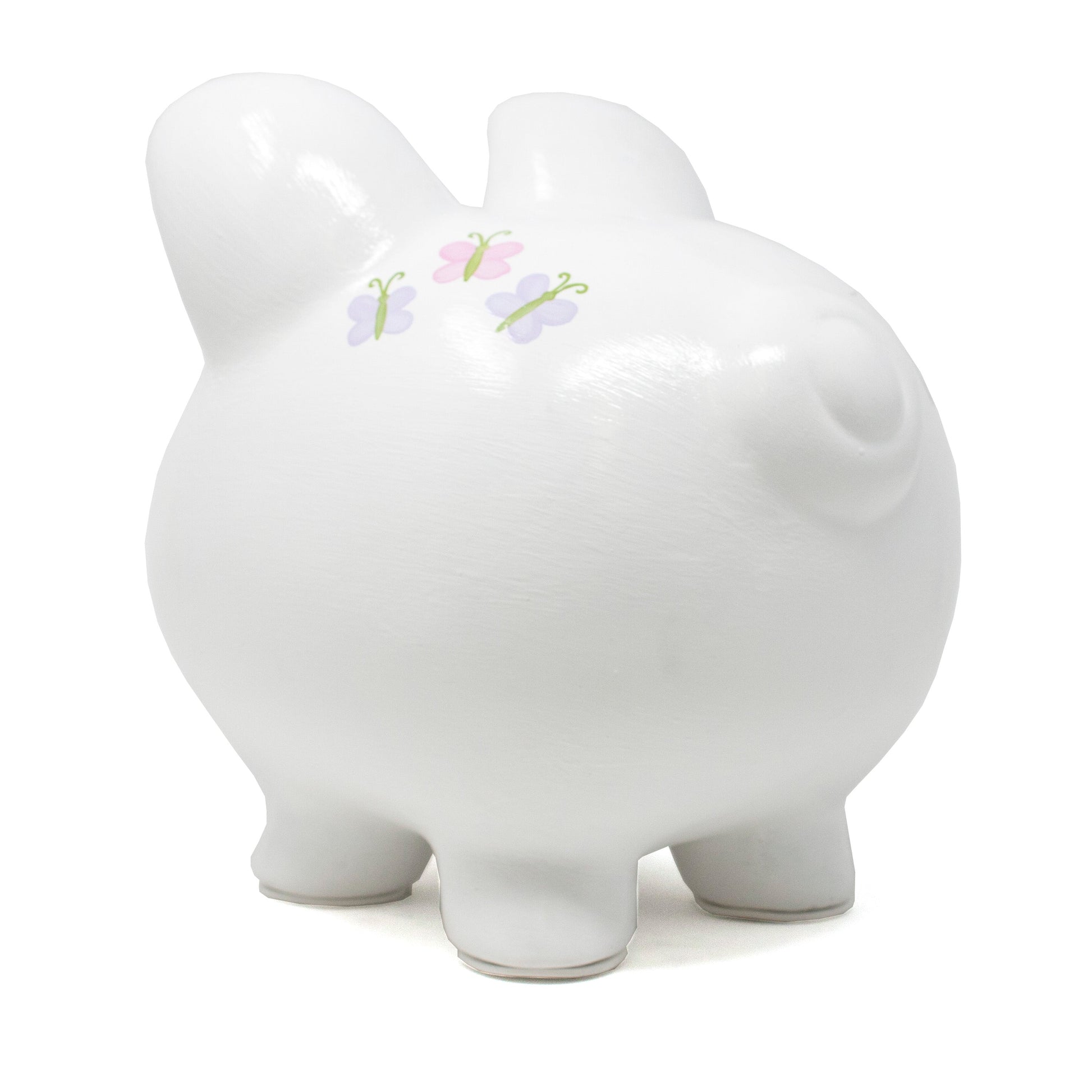 Opposite side view of white piggy bank featuring a horse with saddle and pink and purple flowers