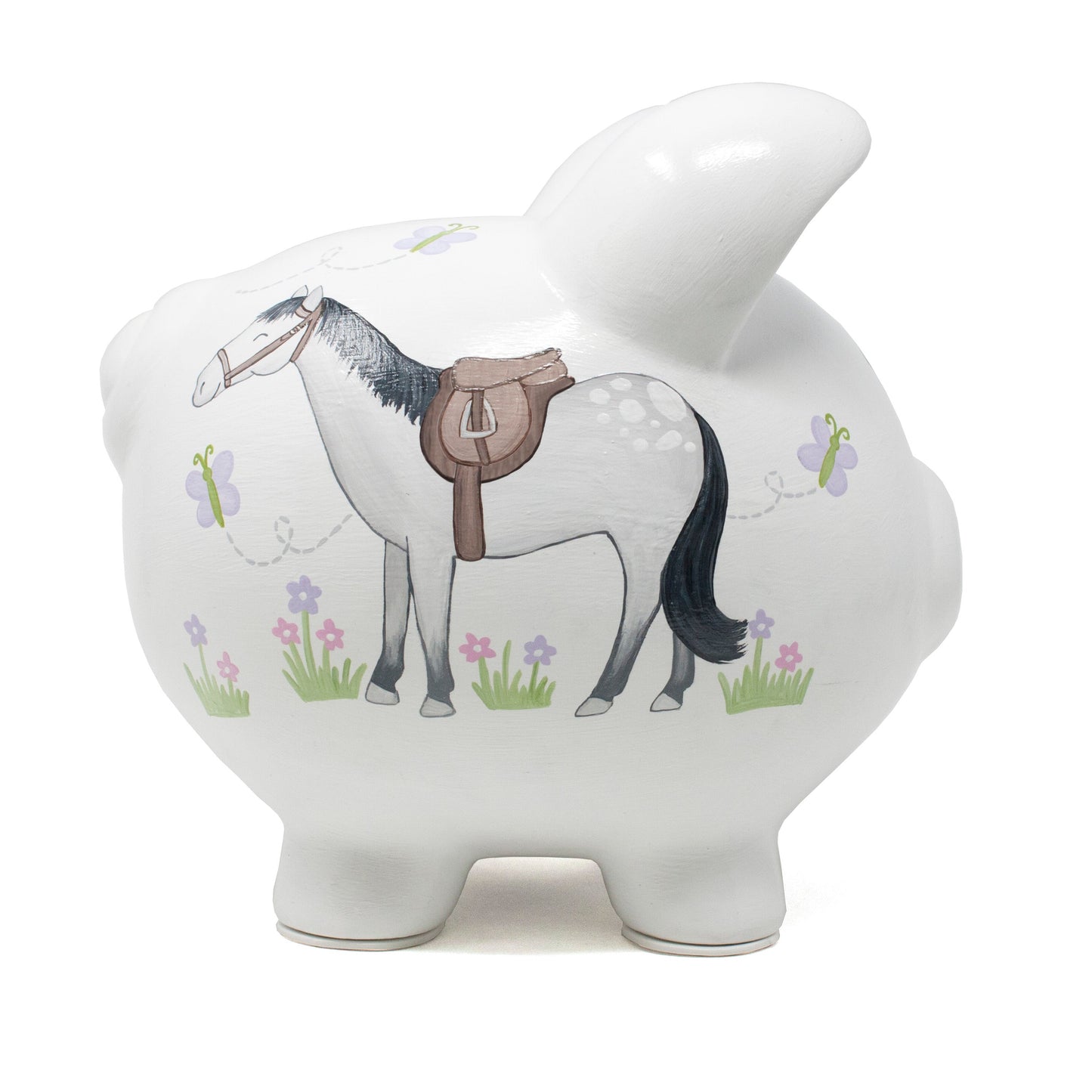 Top-down view showing coin slot on white piggy bank and butterfly decorations