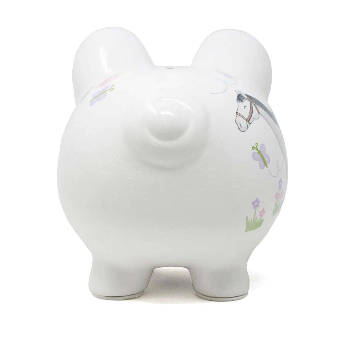 Rear view of white piggy bank with painted flowers and horse tail