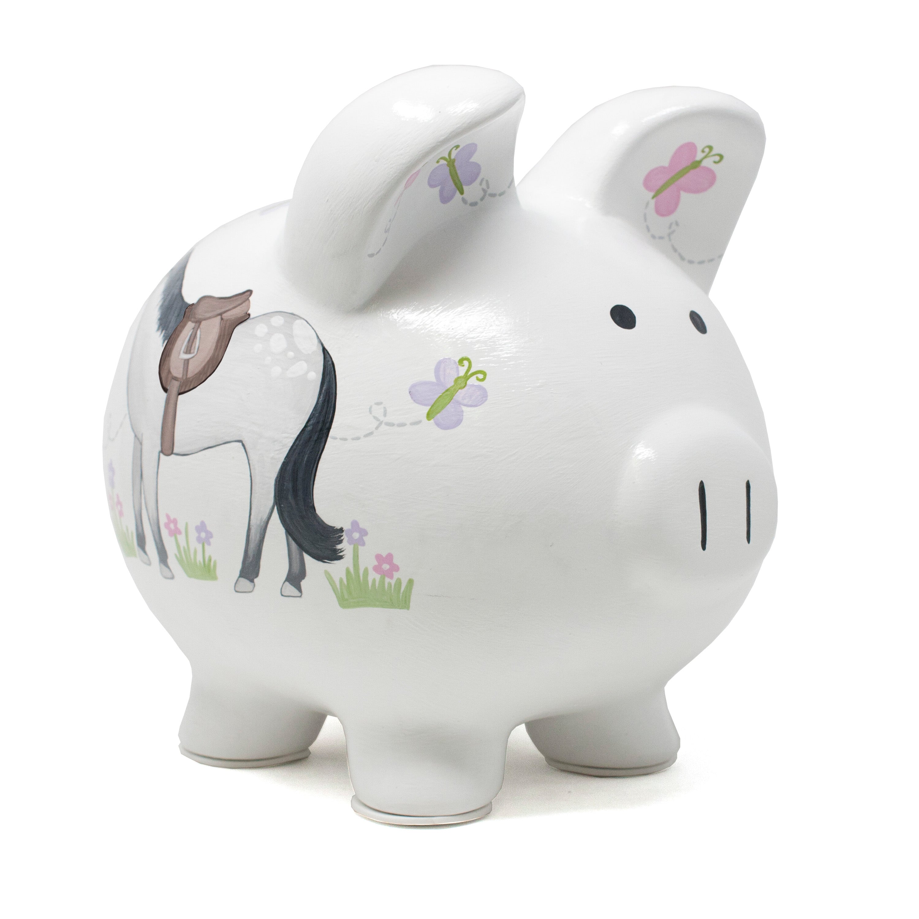 Side view of white piggy bank with handpainted horse and butterflies