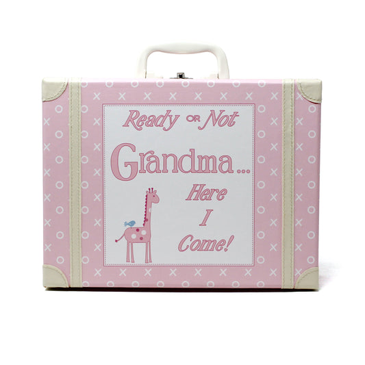 Front view of pink kids suitcase with 'Ready or Not Grandma Here I Come' text and giraffe illustration