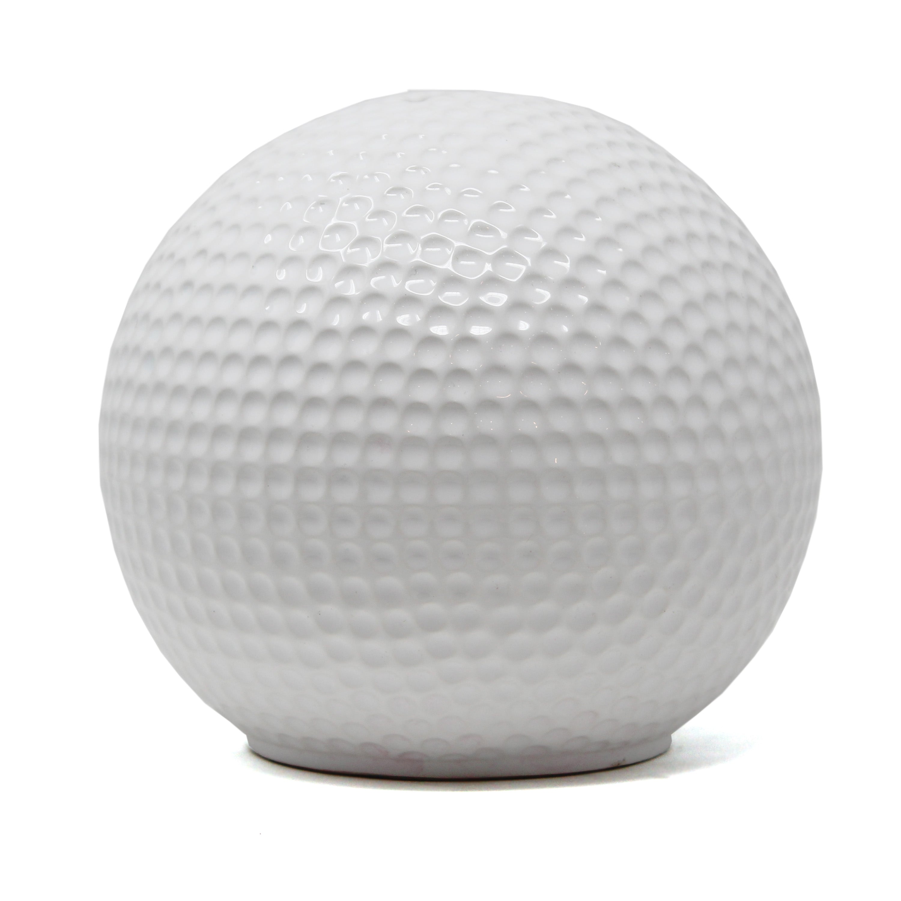 White ceramic piggy bank shaped like a golf ball with textured dimples