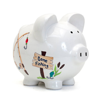 side view of Gone Fishing handpainted ceramic piggy bank showing fishing rods and sign