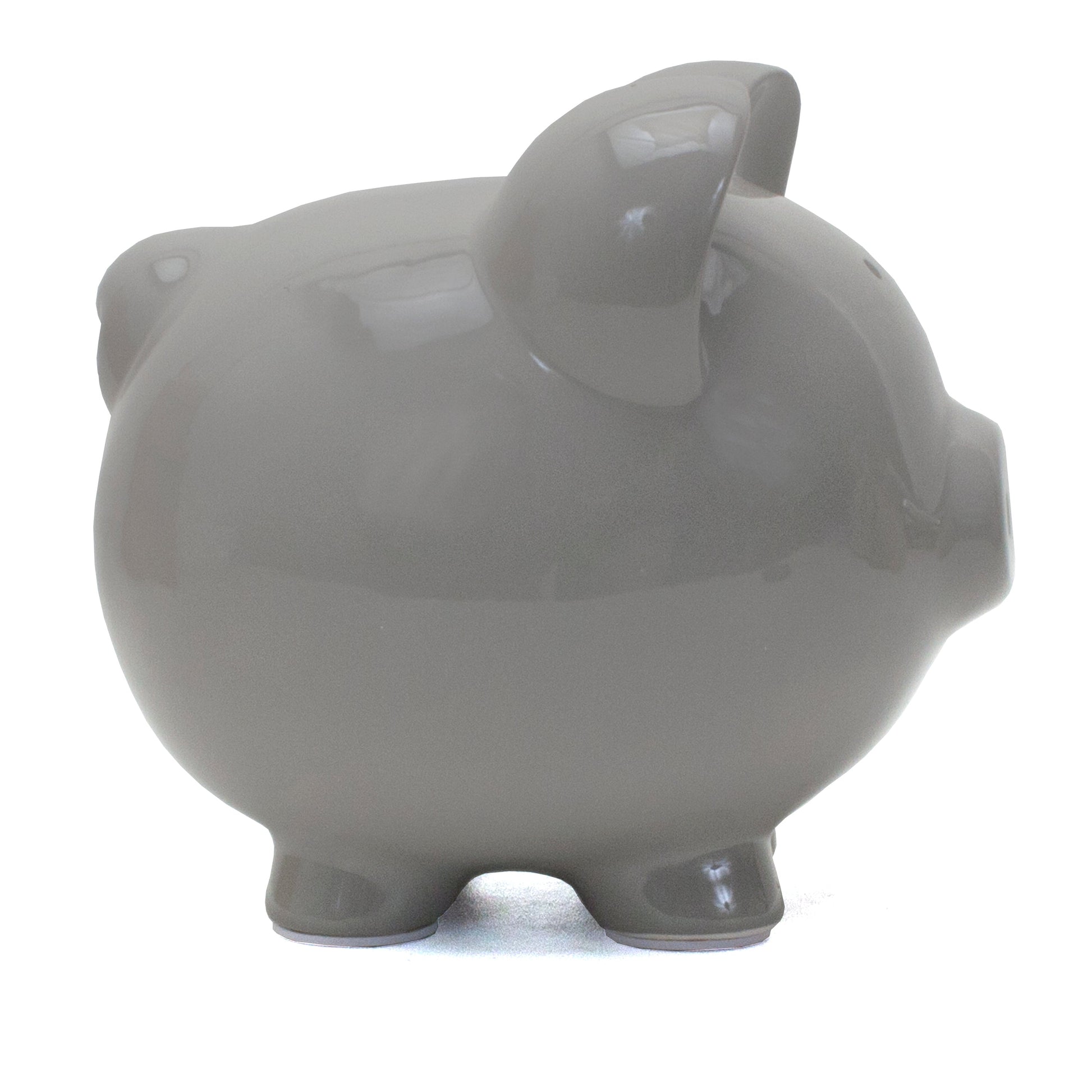 Side view of gray ceramic piggy bank highlighting rounded ears and legs