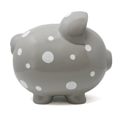 Opposite side view of gray piggy bank with white dots