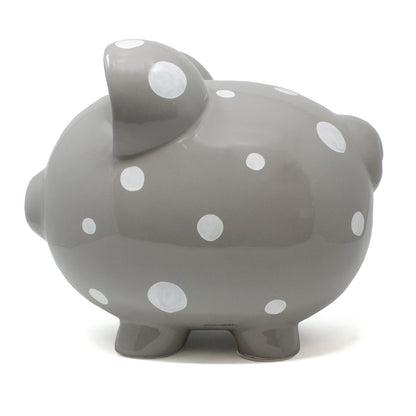 Other side profile of gray piggy bank decorated with white polka dots
