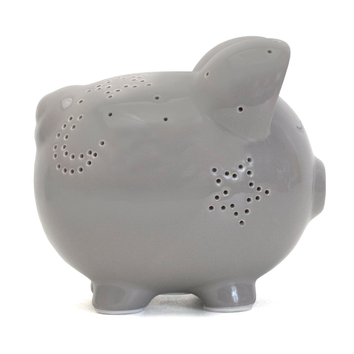 Opposite side view of gray ceramic pig with star perforation patterns