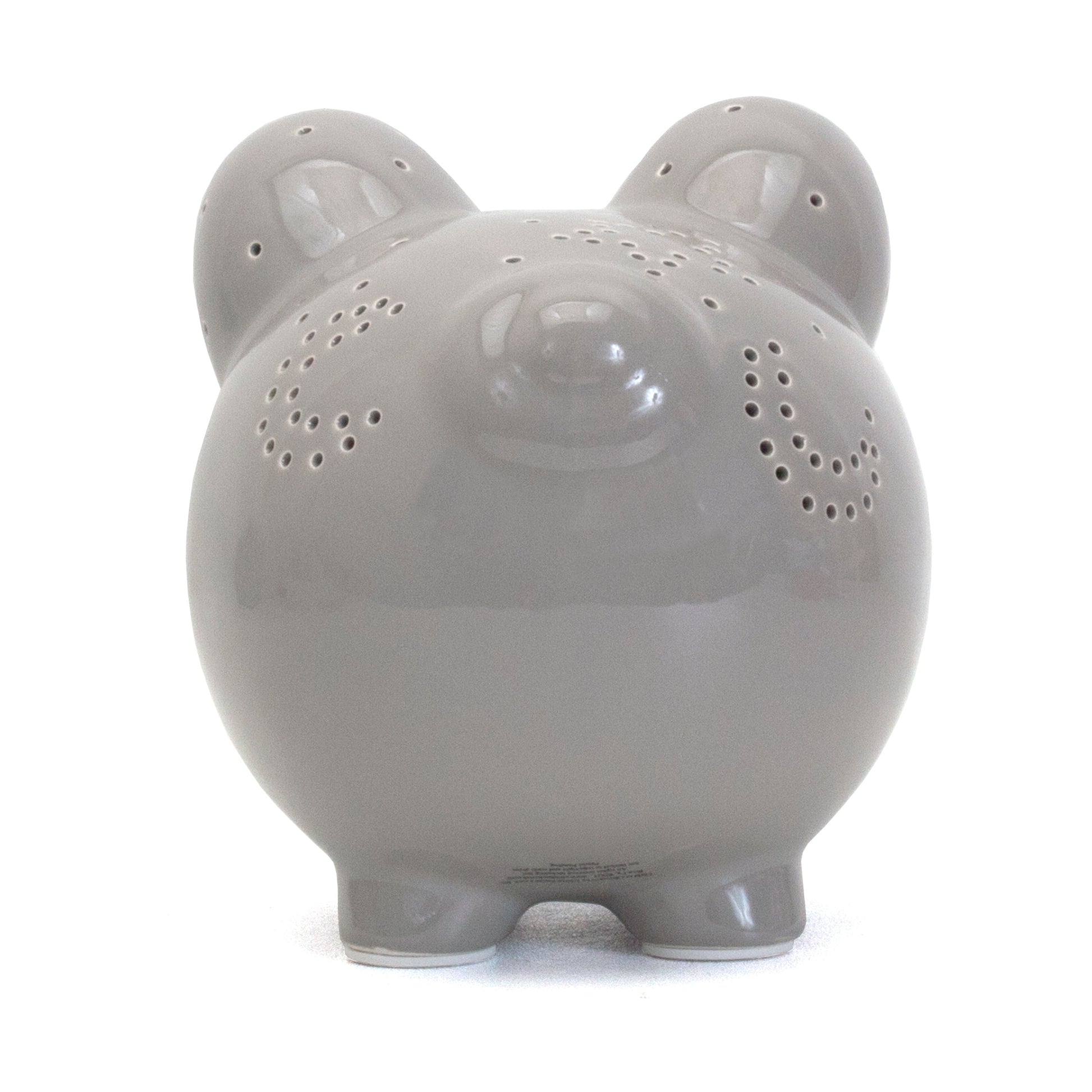 Front view of gray ceramic pig with closed eyes and star perforations on ears