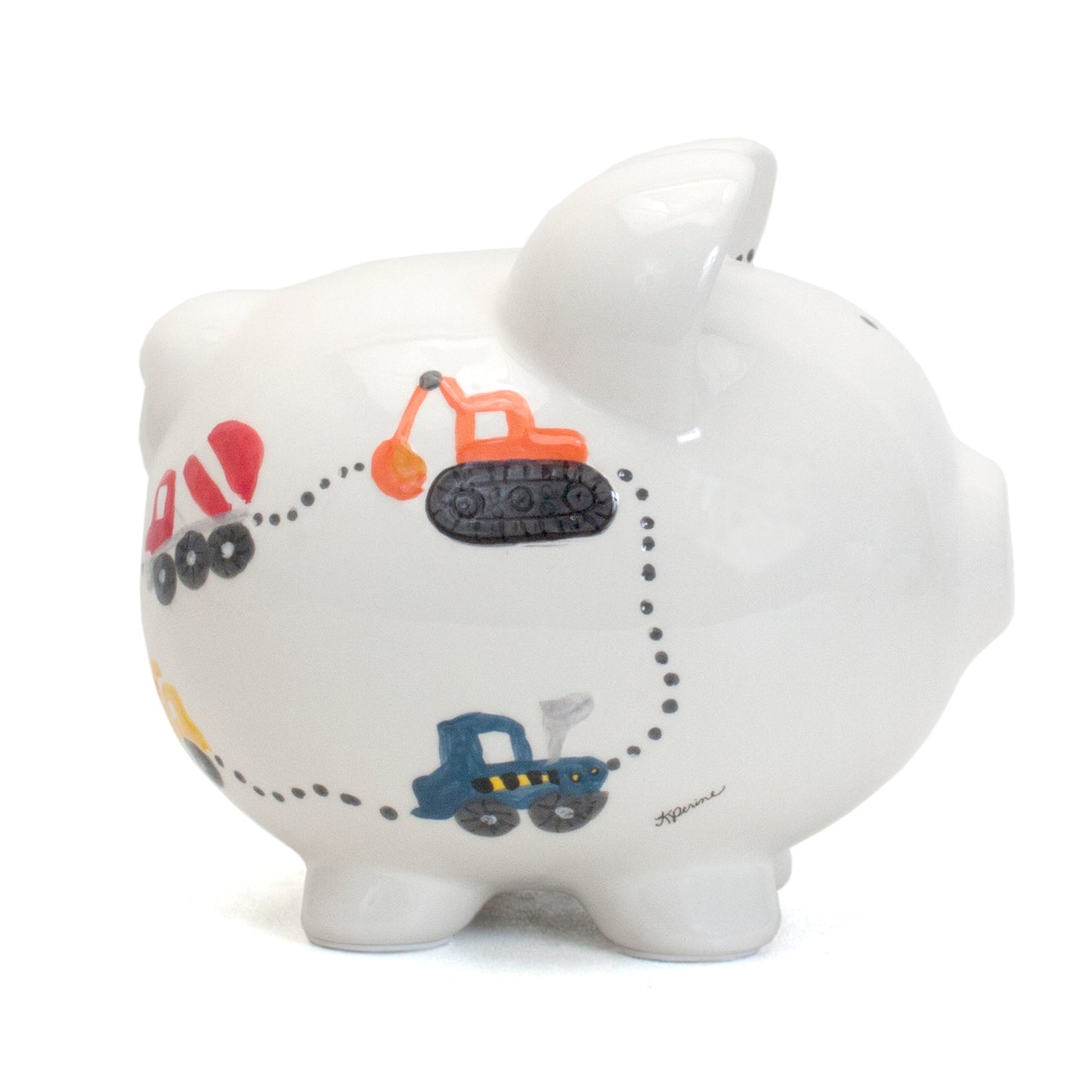 Close-up side view showing brightly handpainted excavator and truck illustrations on piggy bank