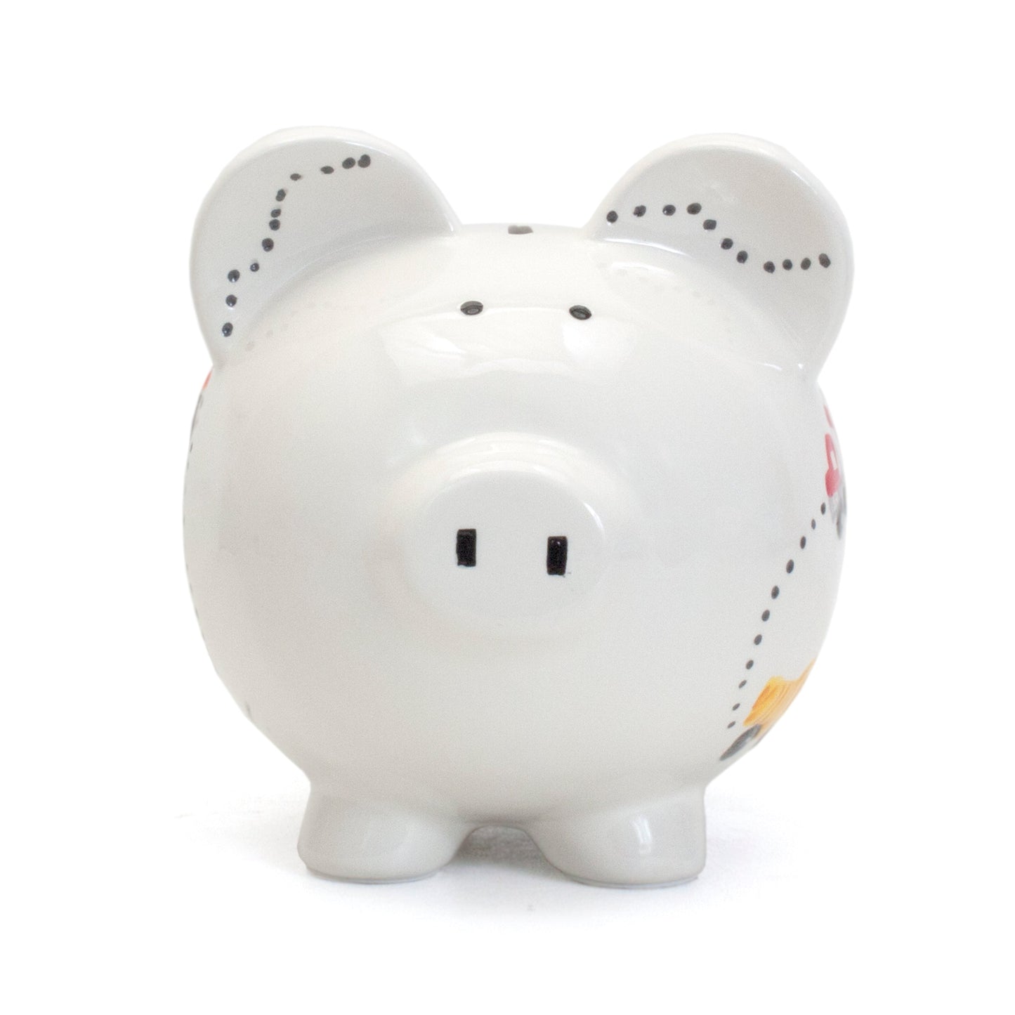 Front view of white ceramic piggy bank with simple black eyes and snout markings