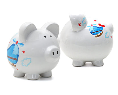 Two white ceramic piggy banks with handpainted blue helicopter design shown from front and back views