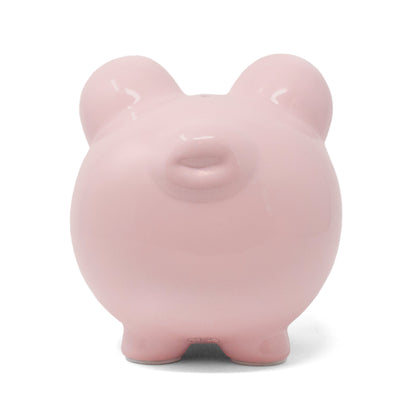 Back view of pink ceramic piggy bank showing simple rounded shape
