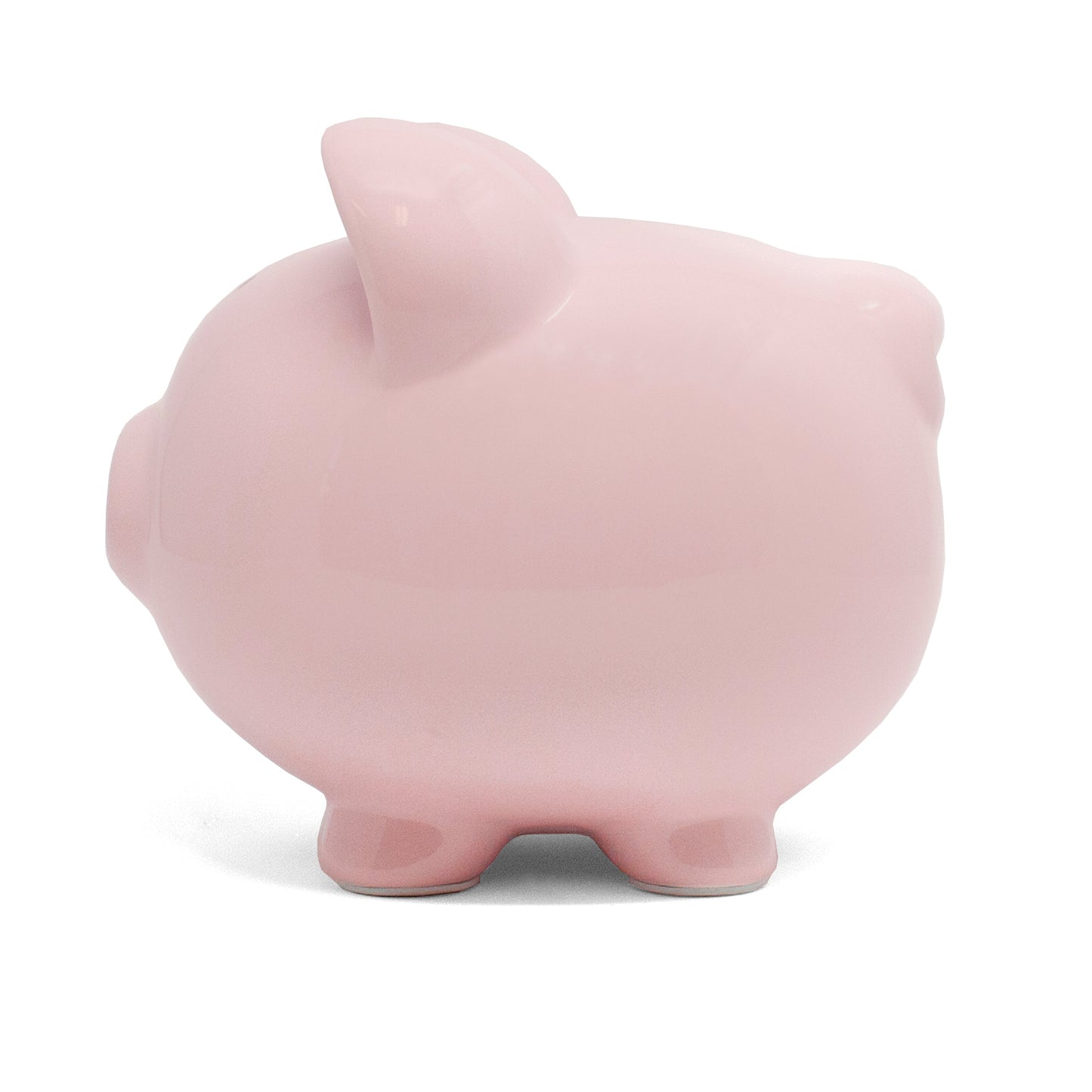 Left side view of pink ceramic piggy bank highlighting balanced feet
