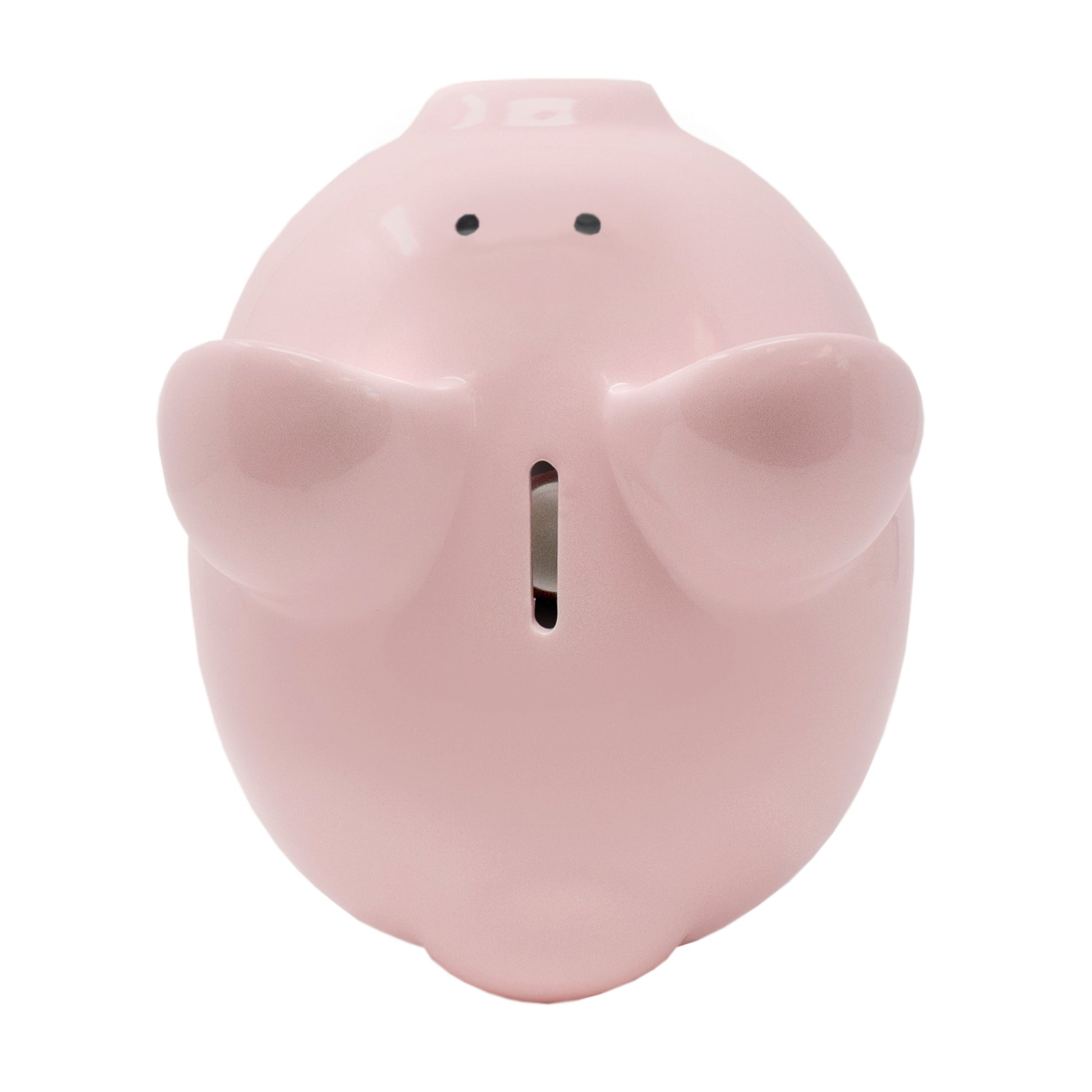 Top view of pink piggy bank showing coin slot between ears