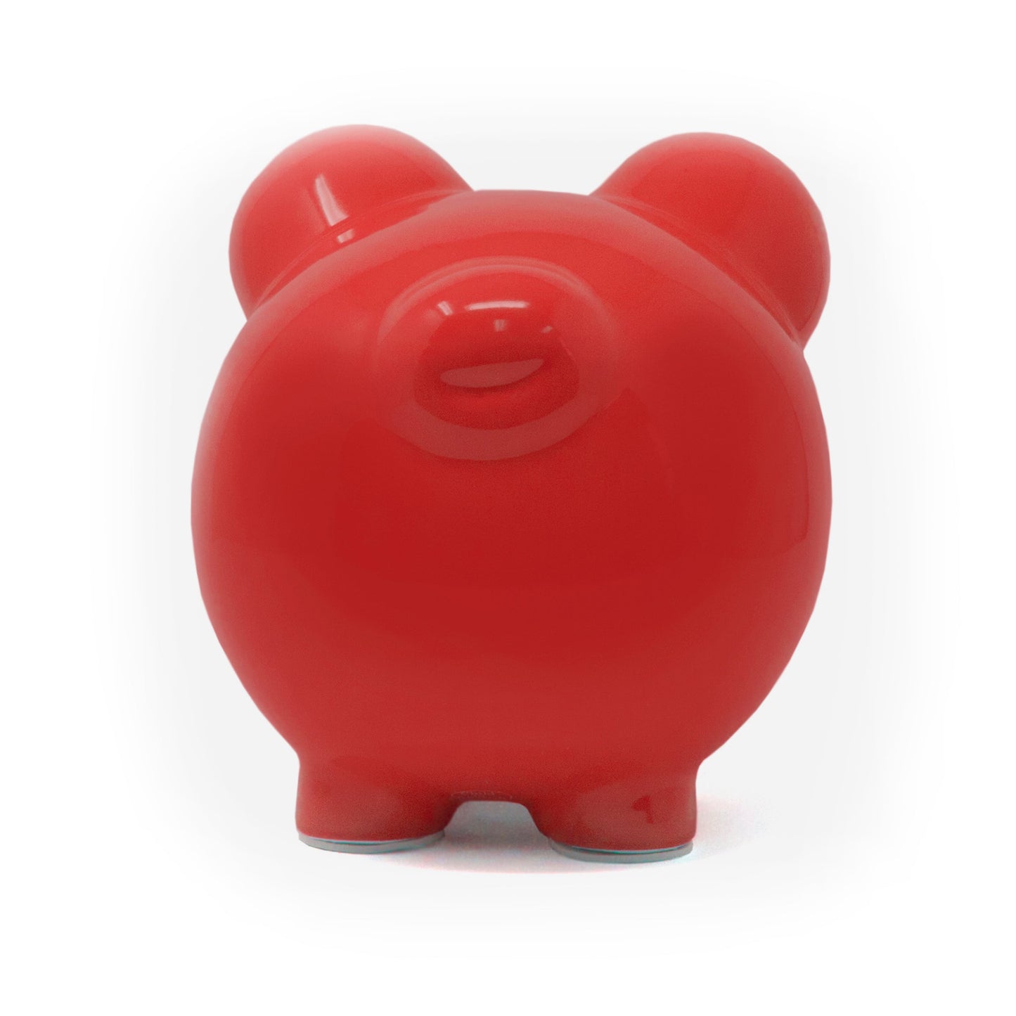 Back view of a smooth, glossy red piggy bank with rounded ears and legs