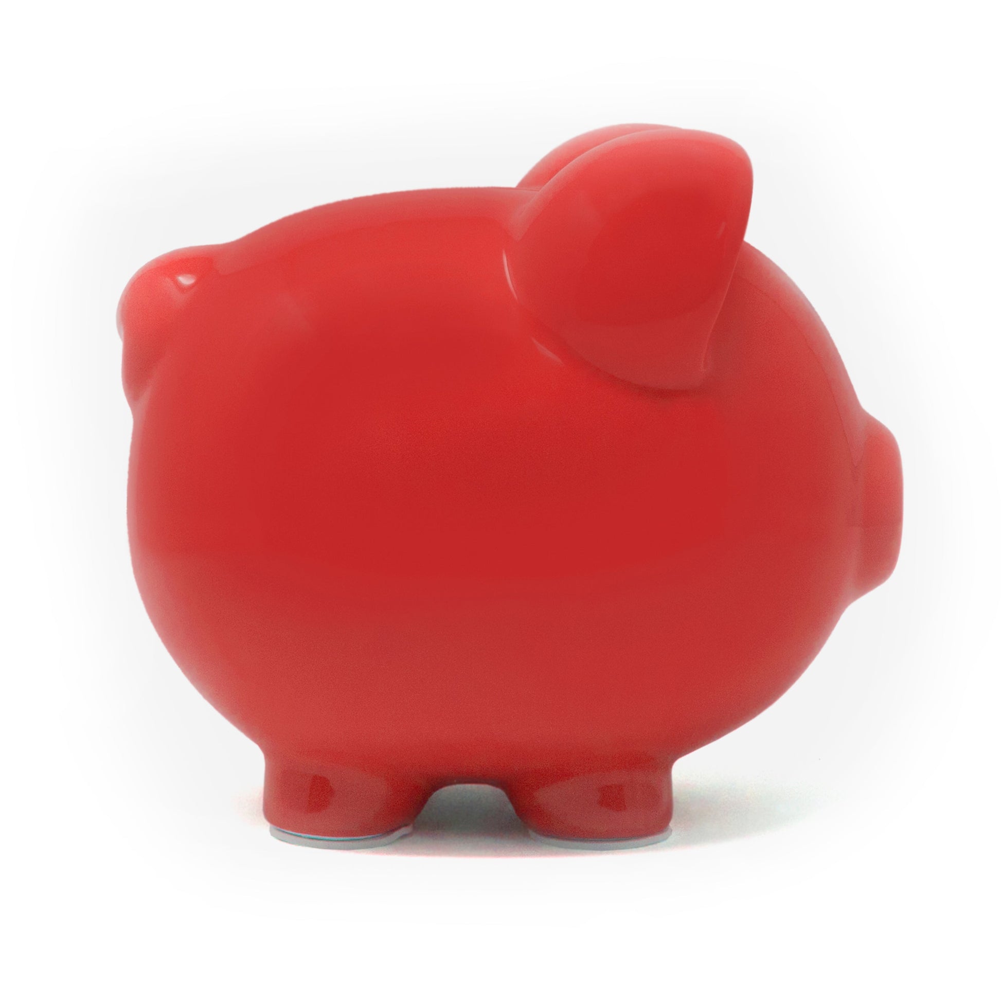 Other side view of the red piggy bank showing its clean finish and rounded shape