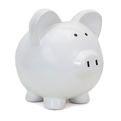White ceramic piggy bank angled view showing smooth finish and painted eyes