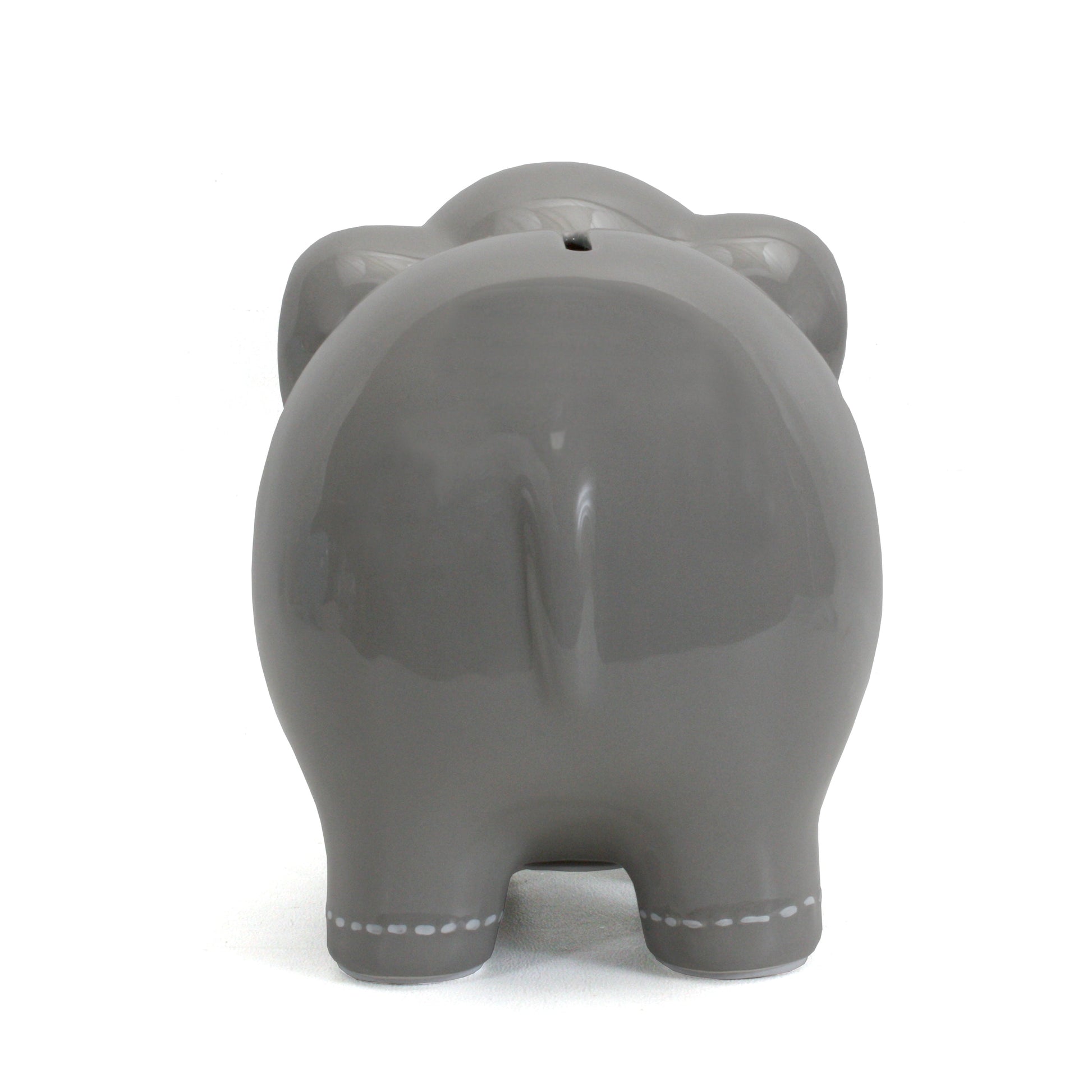 Back view of large grey elephant piggy bank with visible coin slot and stitched foot details