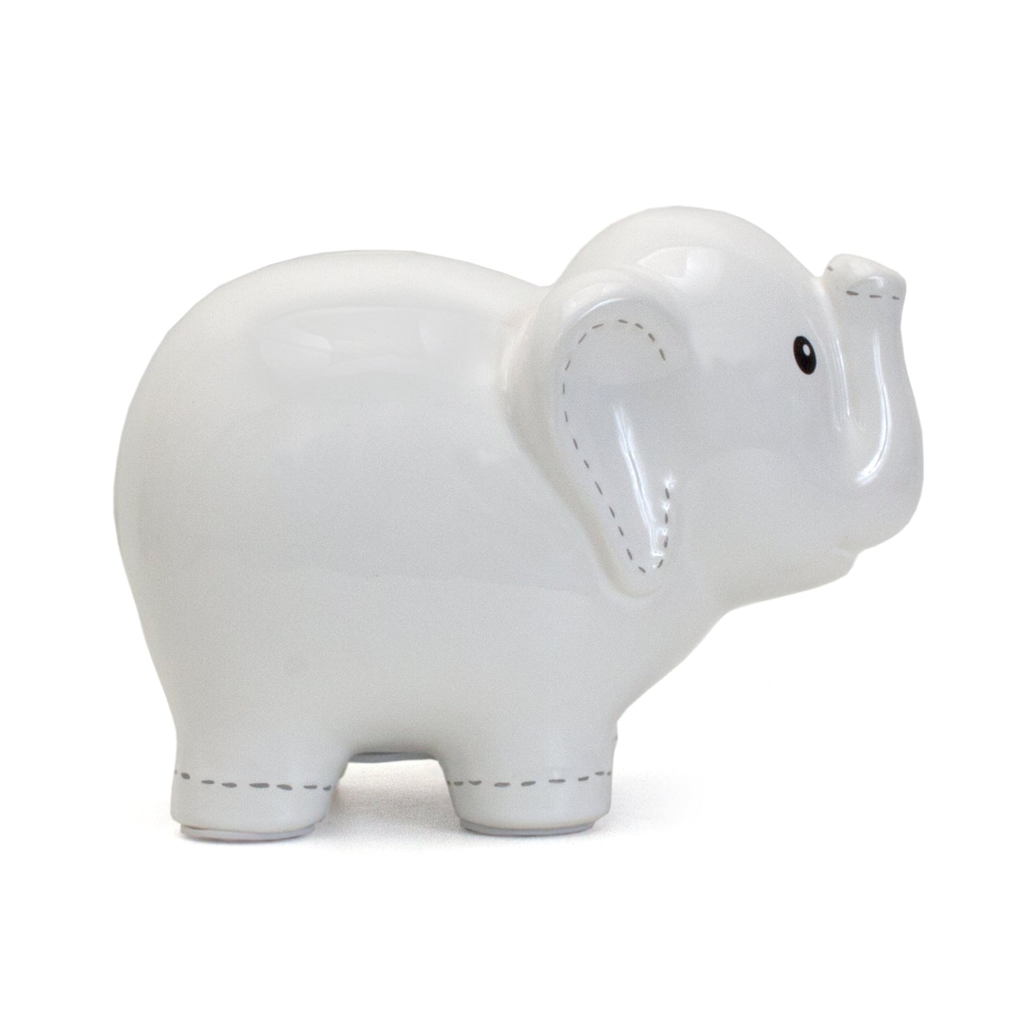 Right side view of white elephant piggy bank highlighting smooth ceramic surface
