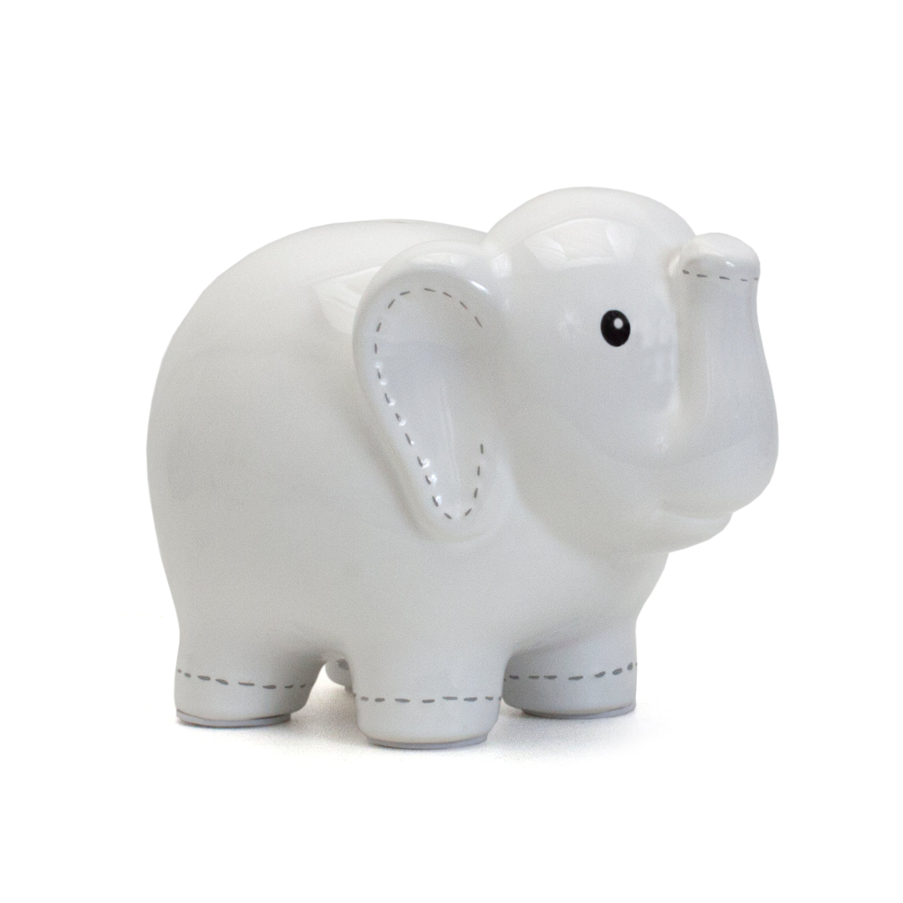 Large white ceramic elephant coin bank with stitched detail on left side