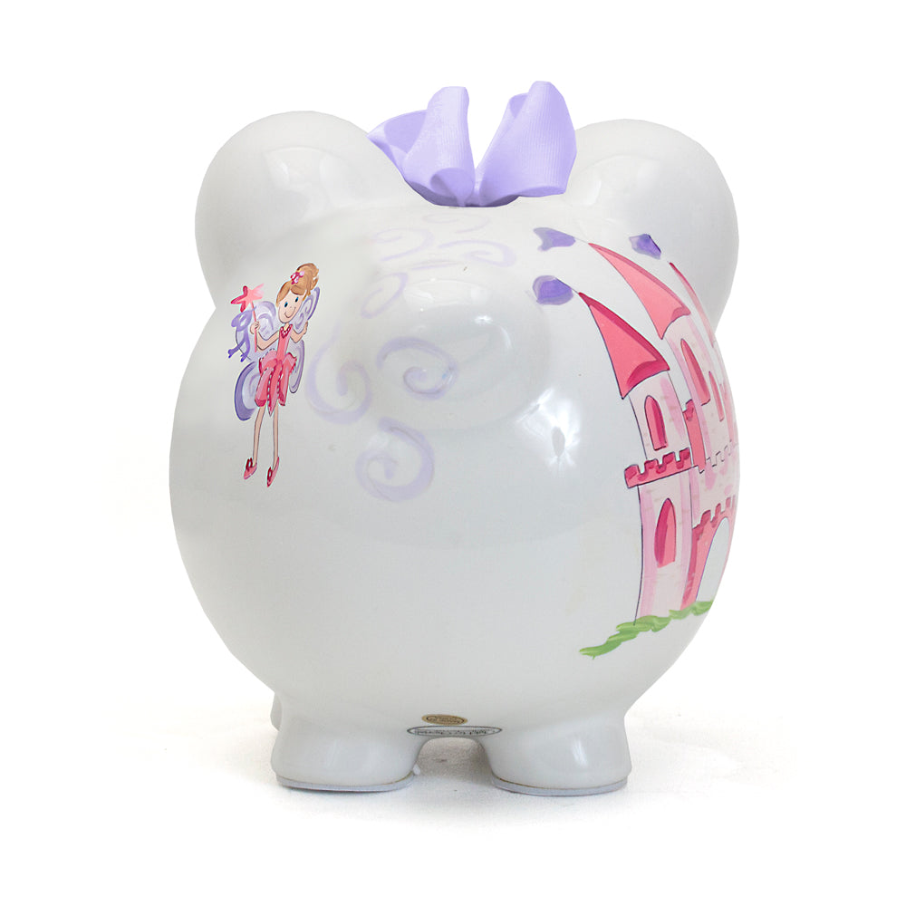 Back side of magical fairy piggy bank showing pink castle and fairy illustration