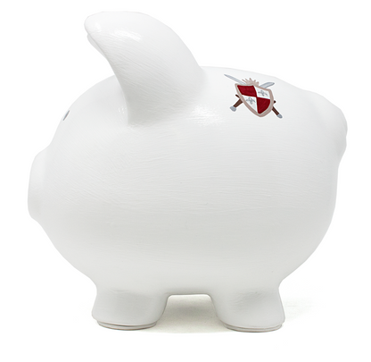 Side view of white piggy bank showing red shield with crossed swords painted near back