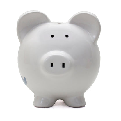 Front view of white ceramic piggy bank with coin slot on top