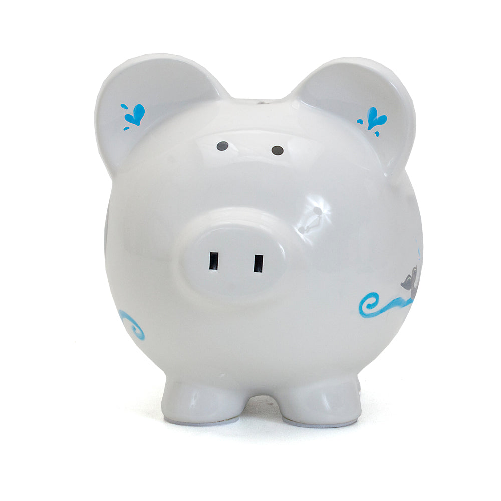 Front view of white ceramic piggy bank with simple nose and eyes, and blue wave details on side