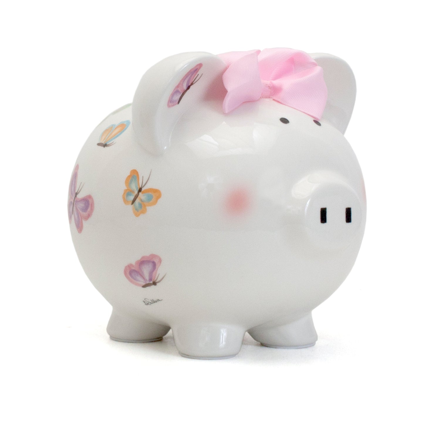 Front angle view of white ceramic piggy bank with pink bow and handpainted colorful butterflies
