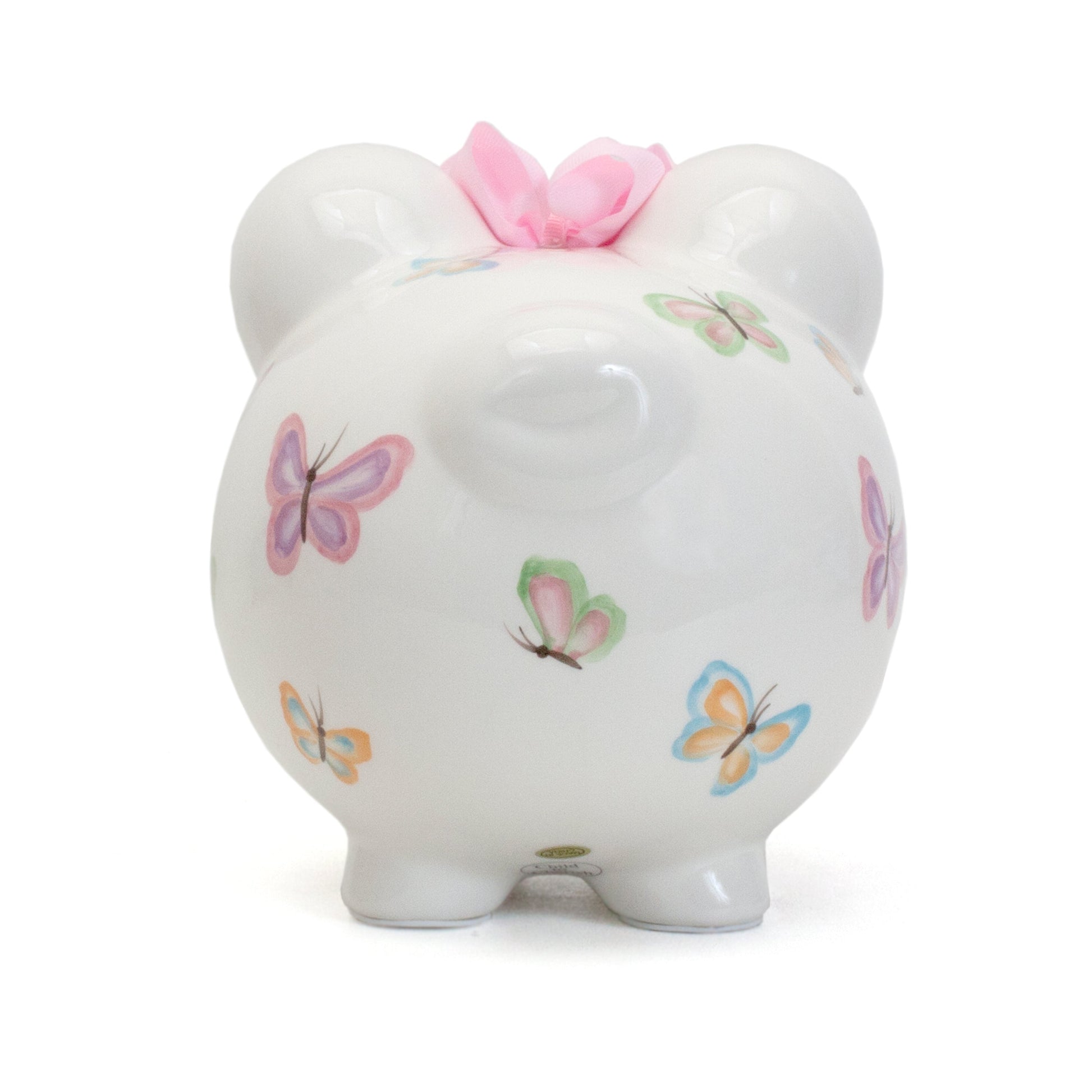 Top view of piggy bank showing coin slot behind the pink bow between ears