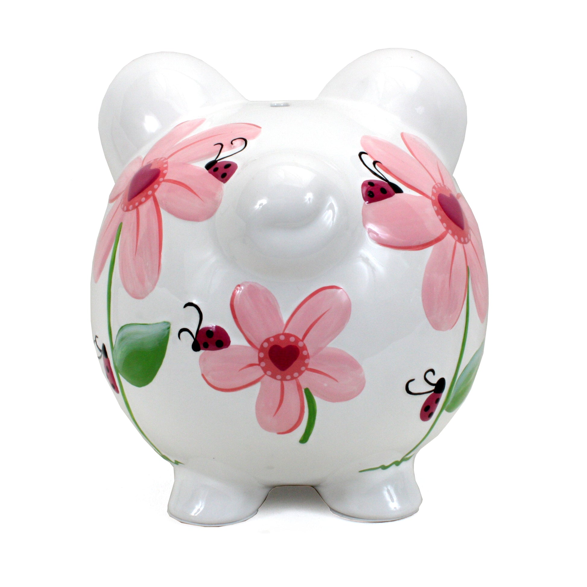 Front view of white piggy bank decorated with handpainted pink flowers and ladybugs