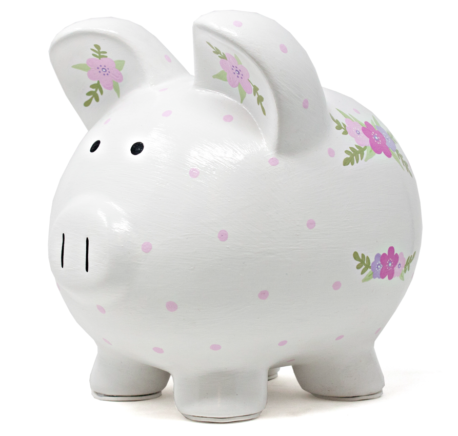 White piggy bank with pink polka dots and floral handpainted details, front left angle