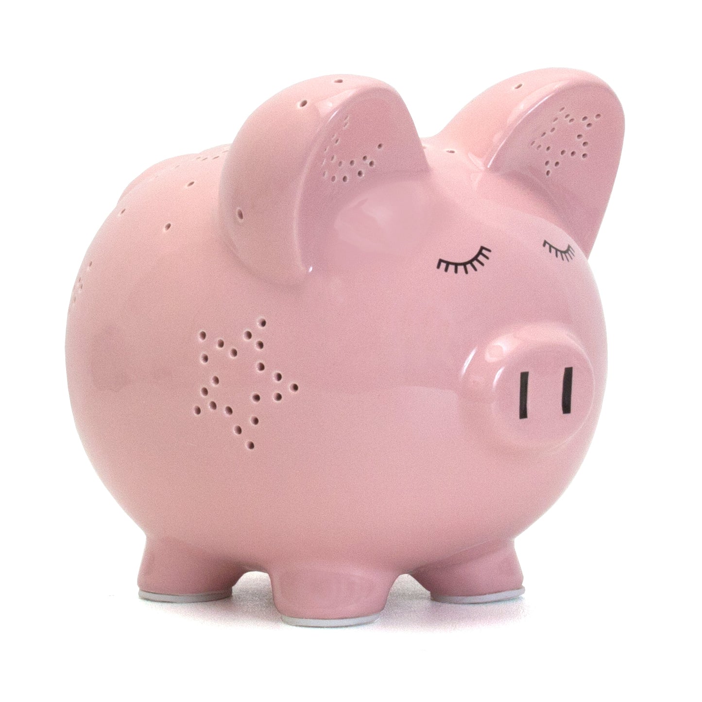 Pink piggy bank showing star-shaped light perforations on ears and body