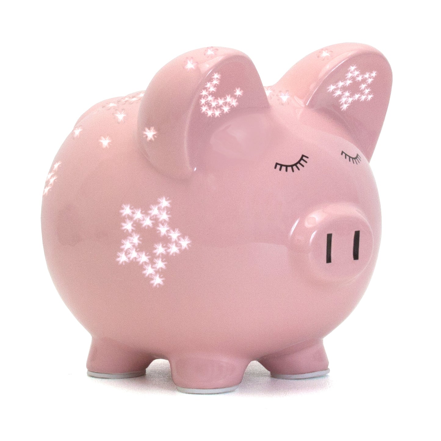 Pink piggy bank with handpainted sleepy eyes and glowing star night light effect