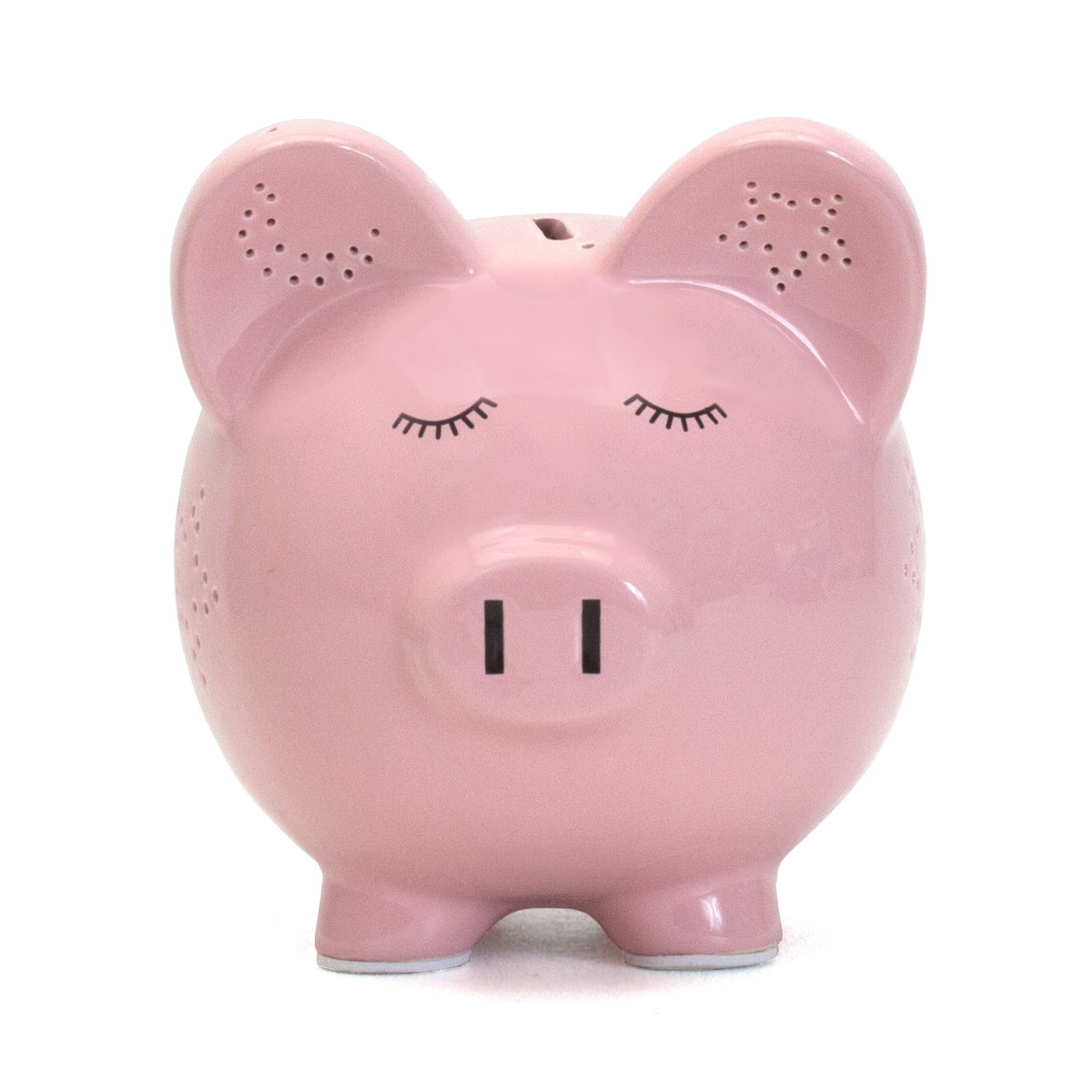 Side view of pink piggy bank showing star perforations on body and ear